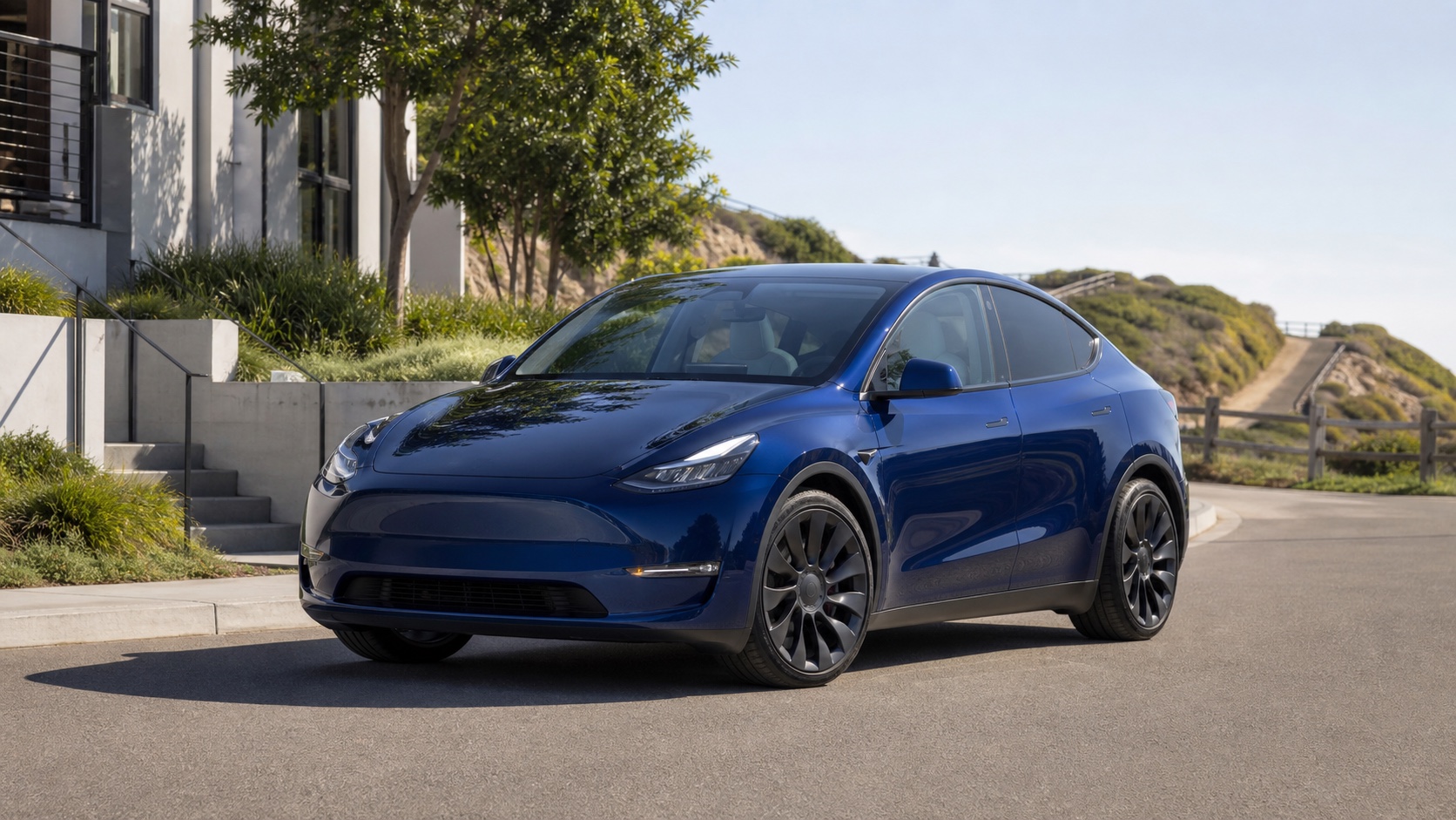 Electric crossover on a bright road for the Tesla Model Y guide